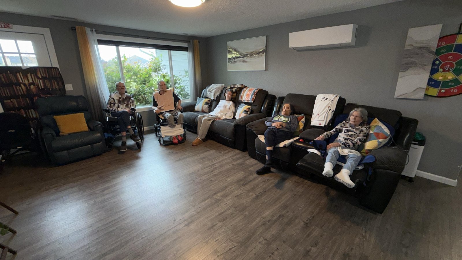 Residents relaxing together in the living room